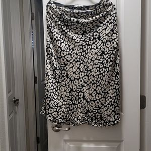 She and sky size large animal print skirt